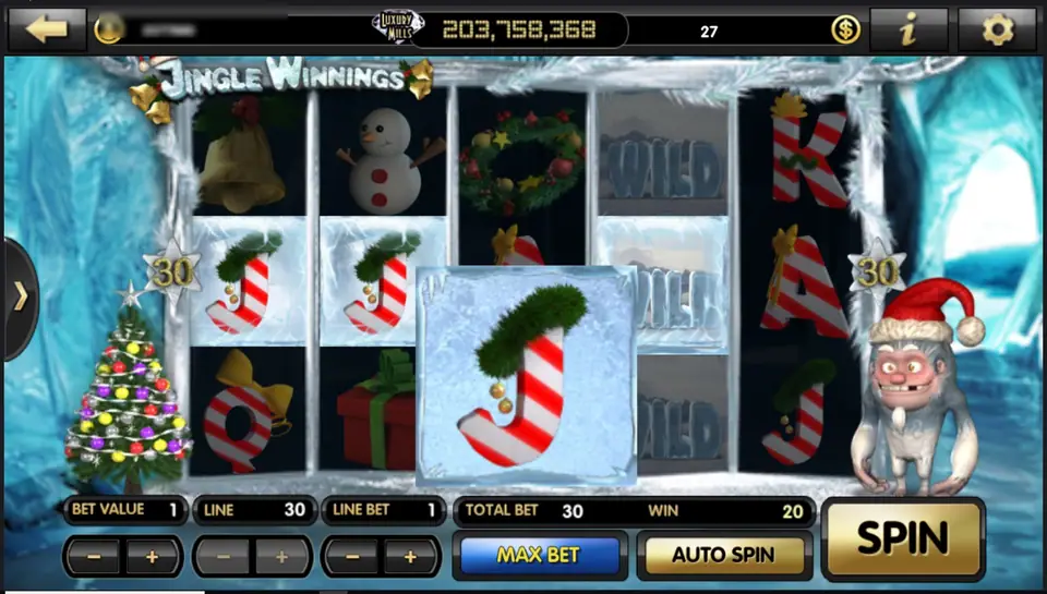 Jingle Winnings with a large frosted J expanding over the middle of the reels, three iced WILD symbols stacked on reel 4 and a win of 20