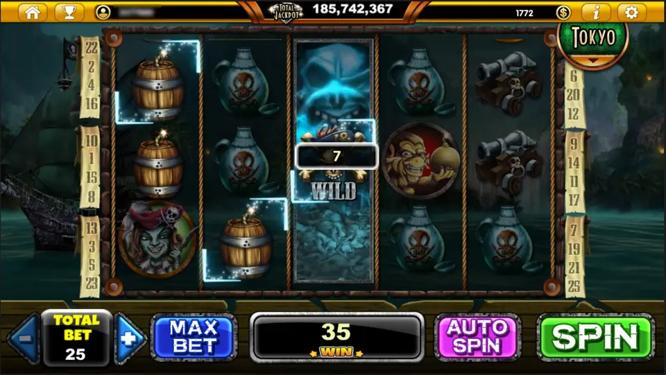 The WILD on reel 3 shown as a glowing blue skull column covering the whole reel, joining powder kegs on reels 1 and 2 for a win of 7, total win 35